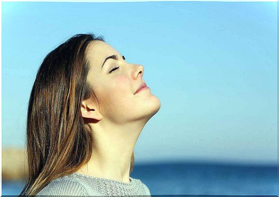 woman doing breathing exercises