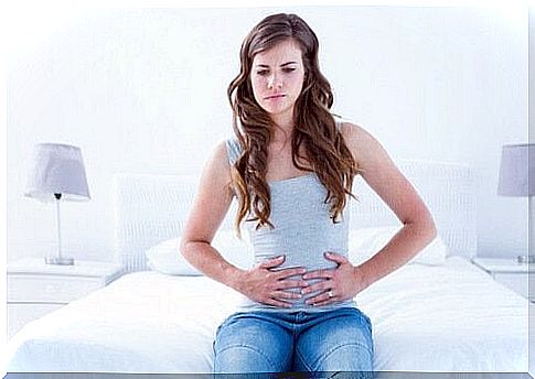 the woman has abdominal pain