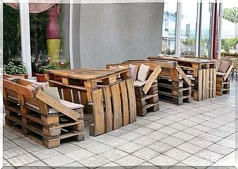 Wooden furniture on the terrace.